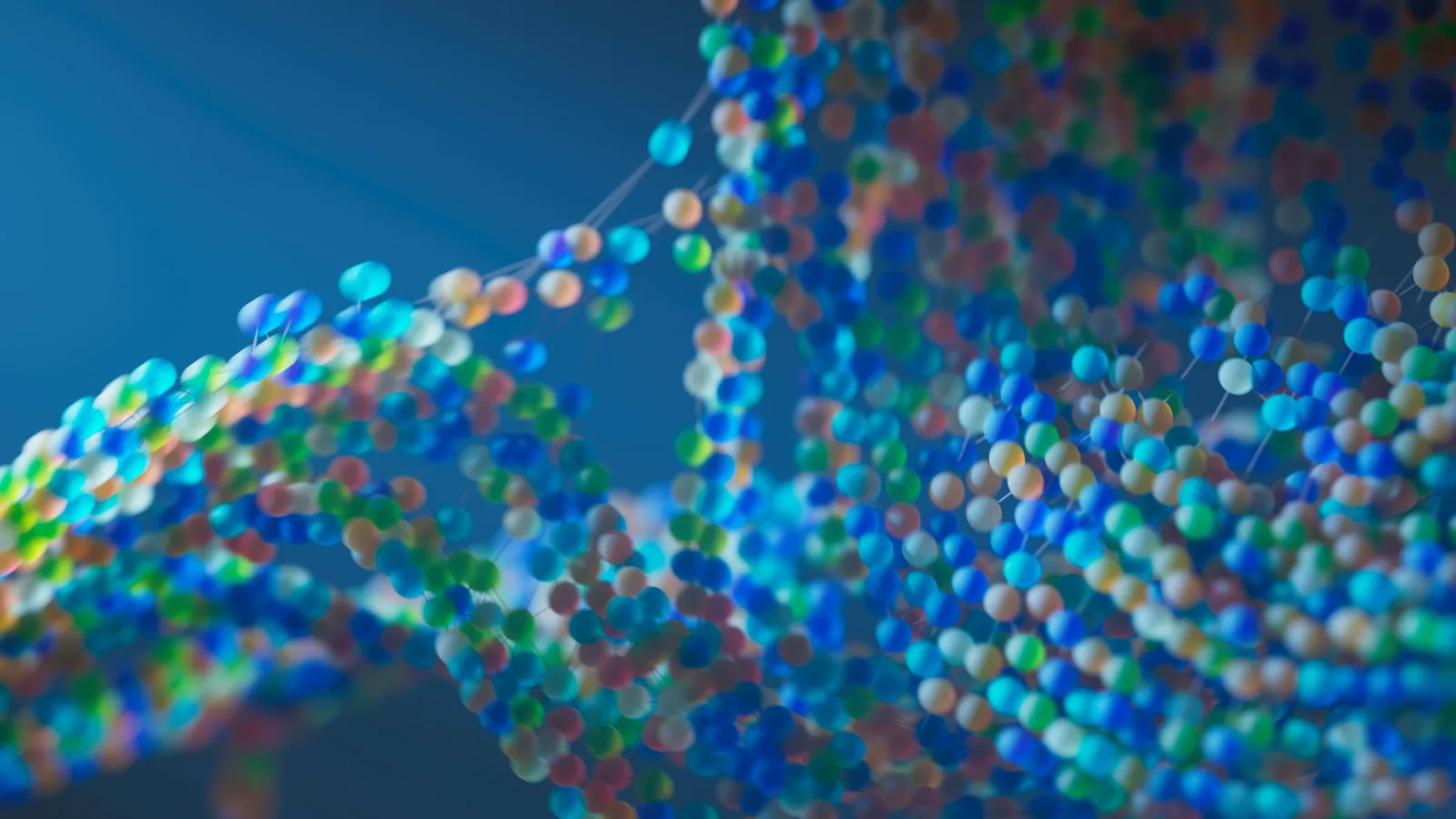 Abstract 3D render of a bead-chain double helix in blue, green and amber, against a dark blue ground